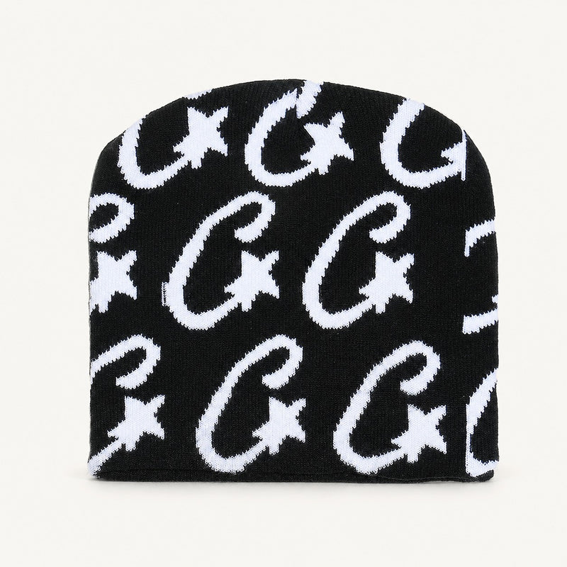 The Rue Signal Jacquard Beanie in Black, front three-quarter view.