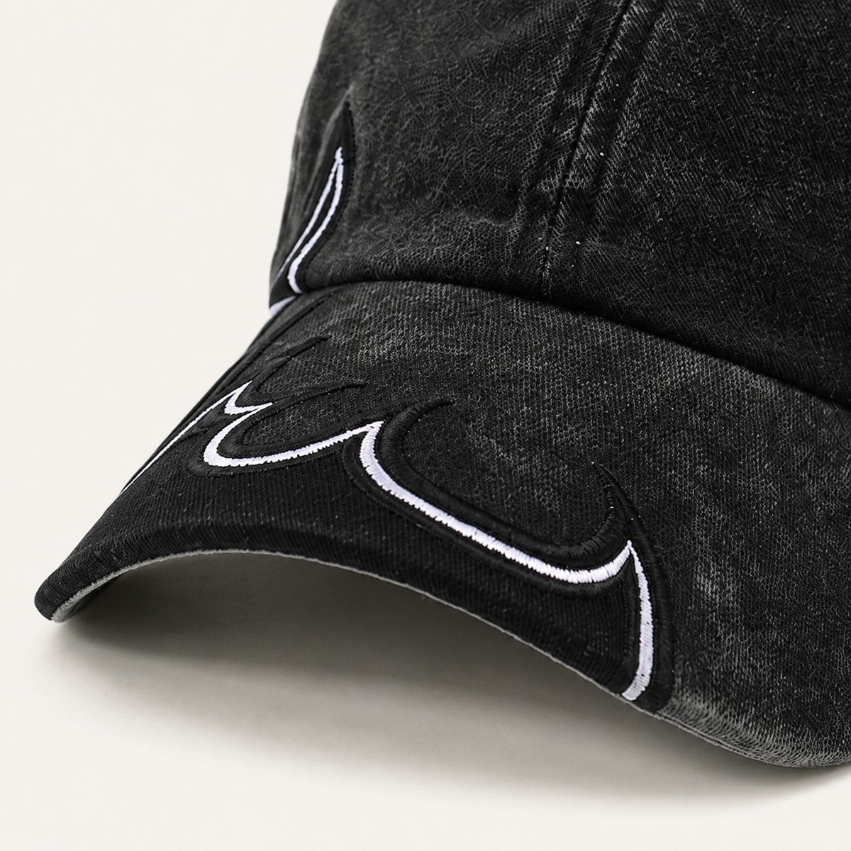 Afterburn Washed Flame Cap in All Black, flame embroidery detail.