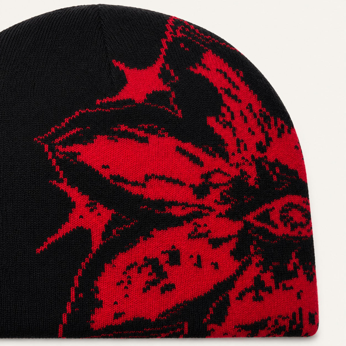 The Rue Afterdark Bloom Beanie in Black And Red, fabric and hardware detail.