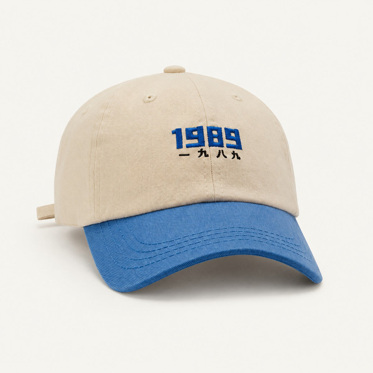 The Rue '89 Contrast Cap in Cream / Royal, alternate view.