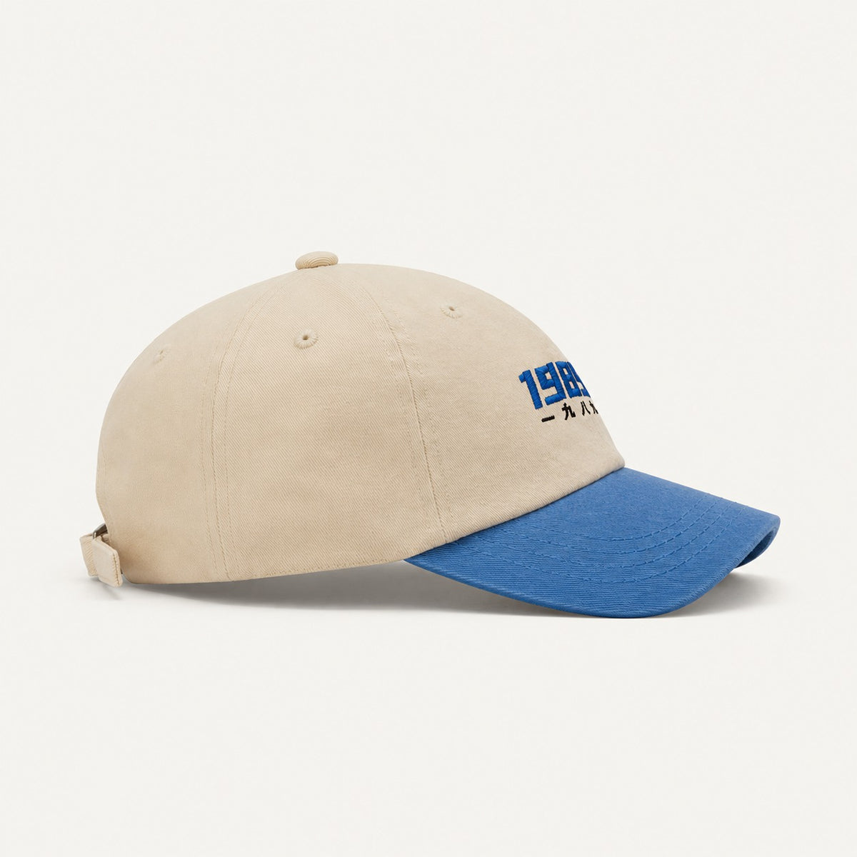 The Rue '89 Contrast Cap in Cream / Royal, alternate view.