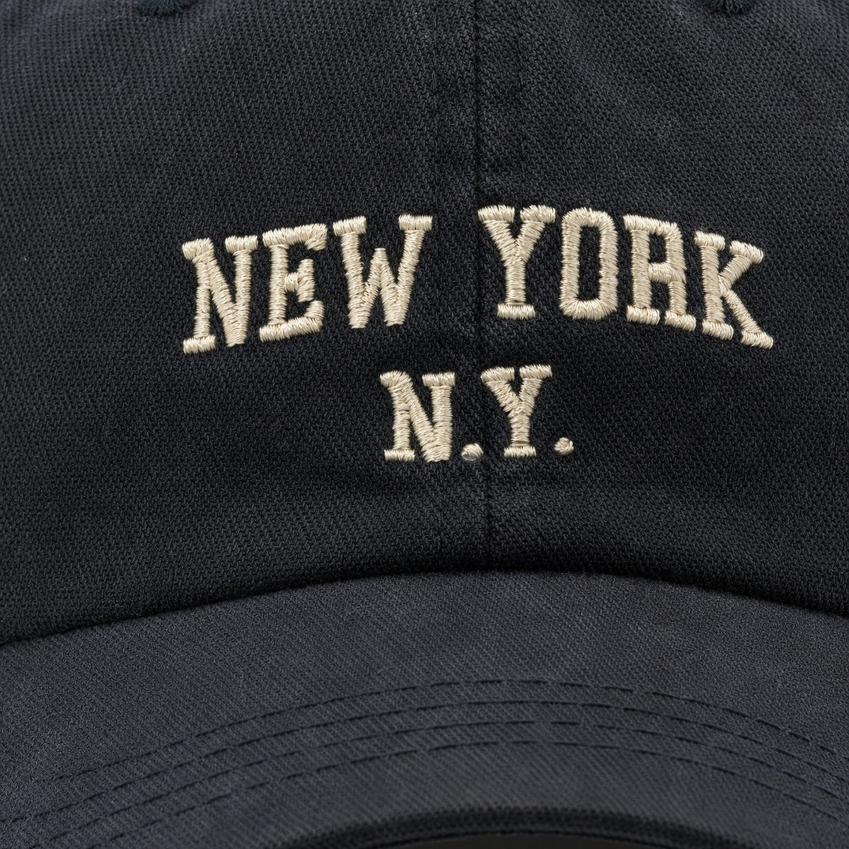 The Rue New York Cap in Charcoal, fabric and hardware detail.