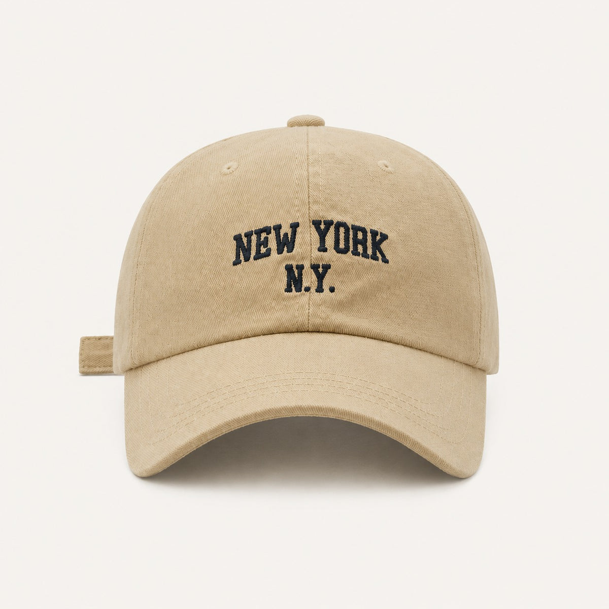 The Rue New York Cap in Sand, straight-on front view.