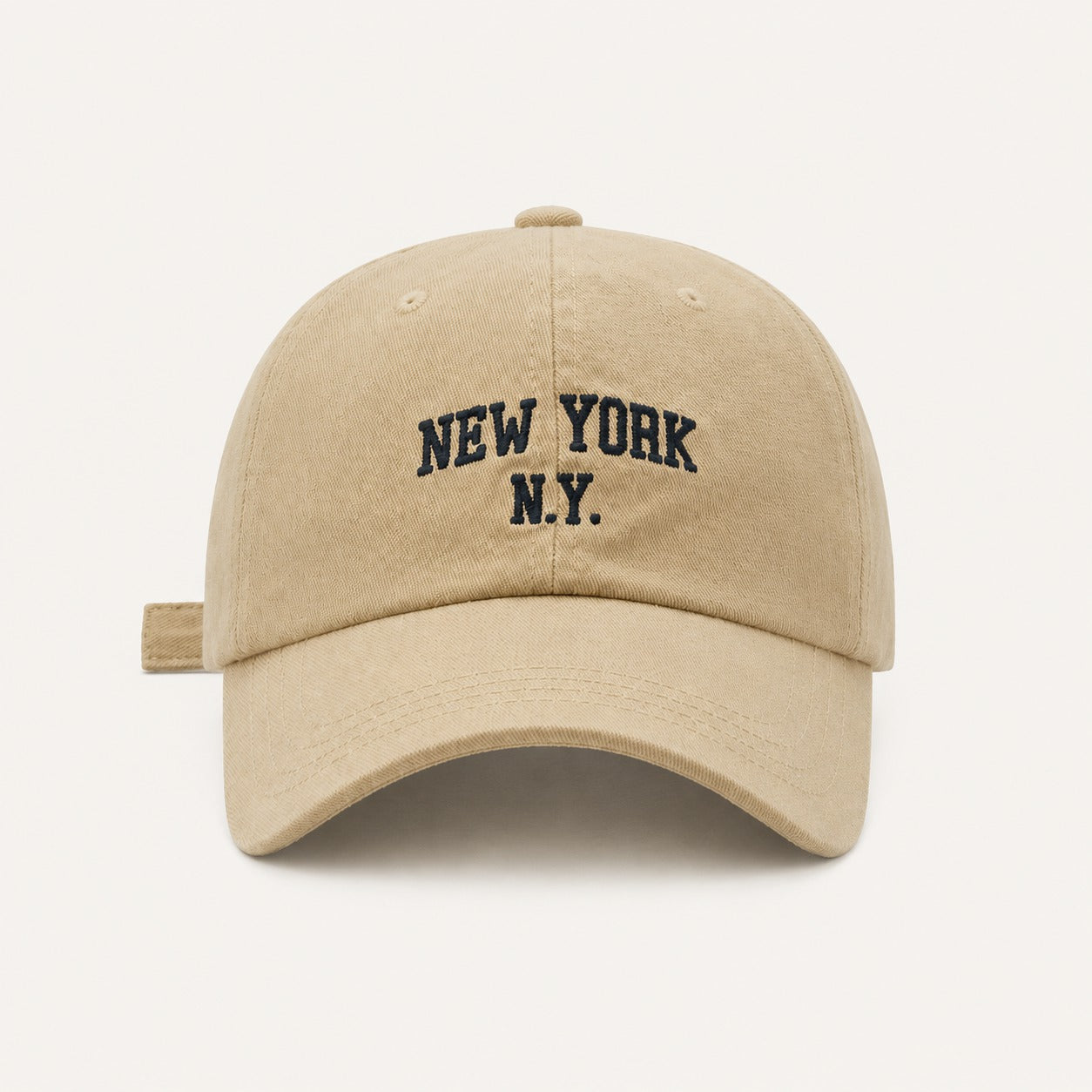 The Rue New York Cap in Sand, straight-on front view.