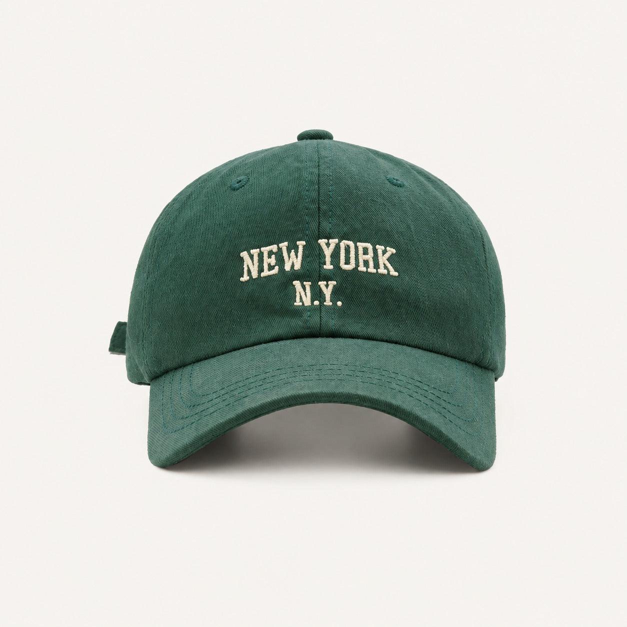 The Rue New York Cap in Forest Green, straight-on front view.