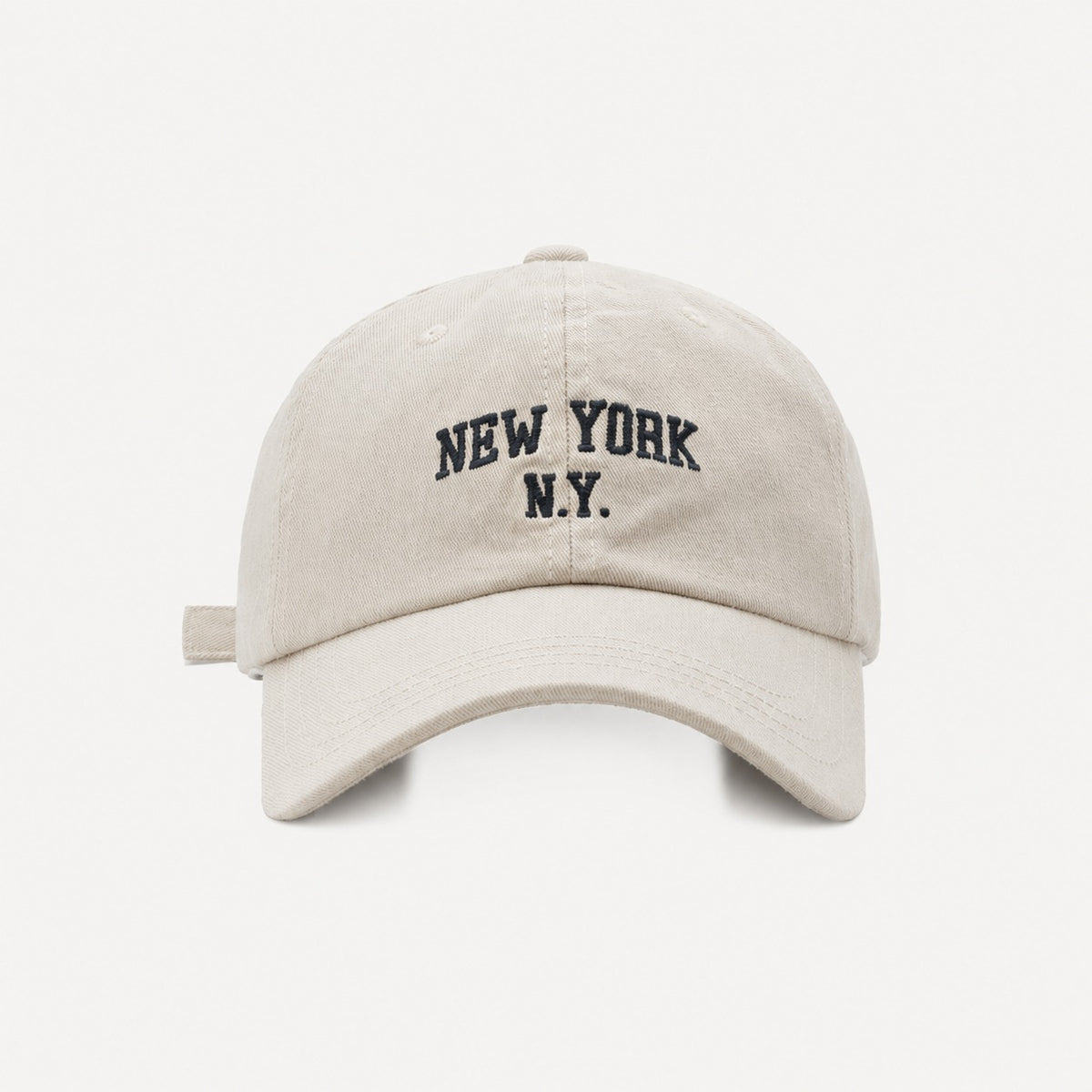 The Rue New York Cap in Bone, straight-on front view.