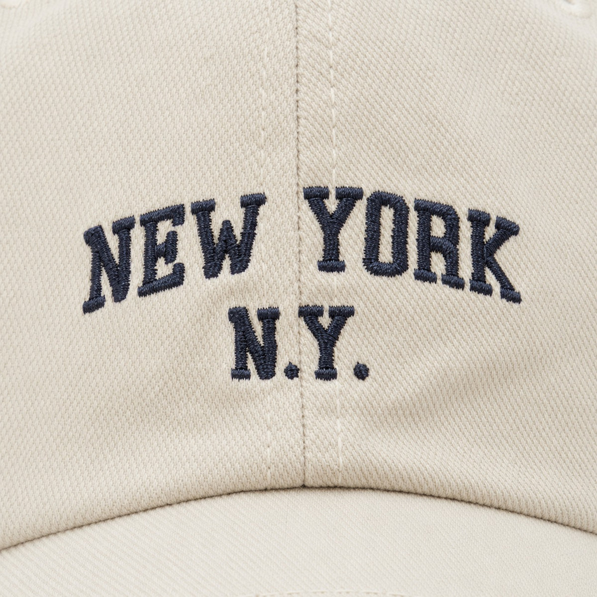The Rue New York Cap in Bone, fabric and hardware detail.