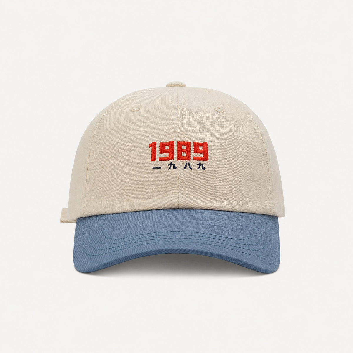 The Rue '89 Contrast Cap in Cream / Sky, straight-on front view.