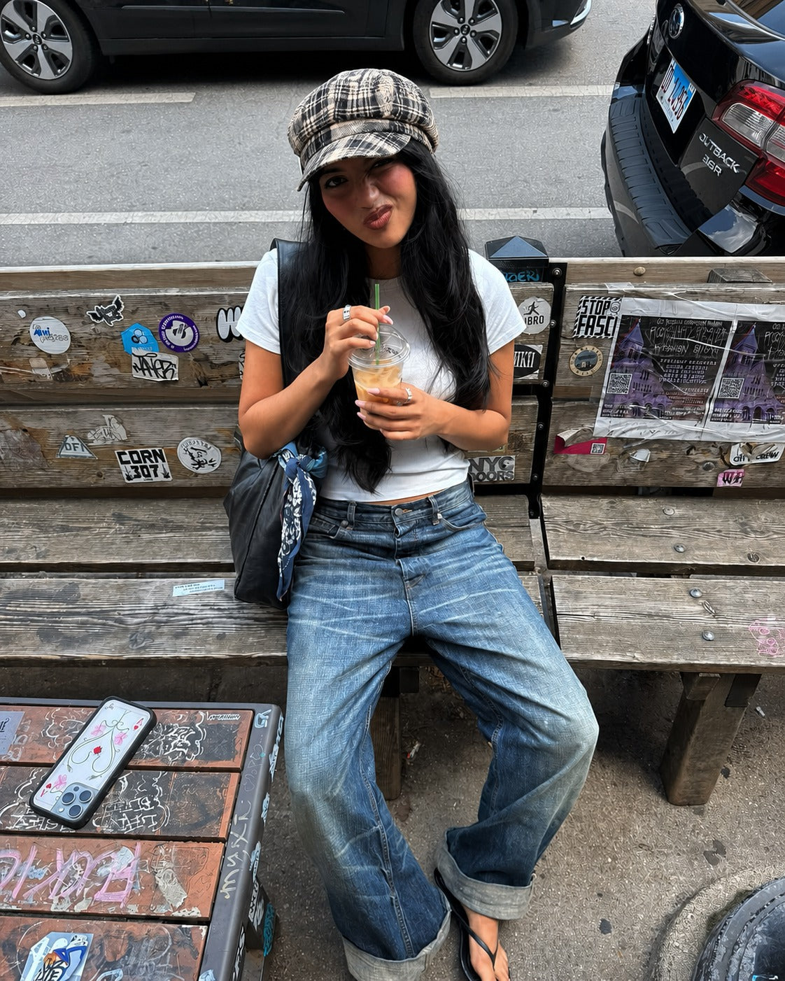 Model wearing the Rue Revival Plaid Newsboy Cap in Black Beige.