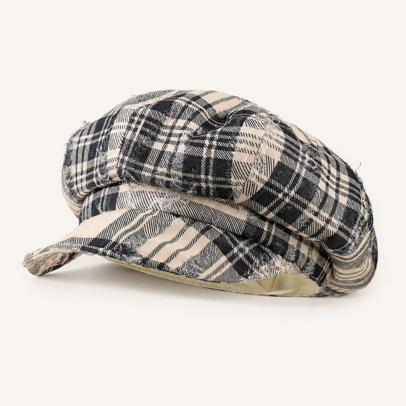 Rue Revival Plaid Newsboy Cap in Black Beige, front three-quarter view.