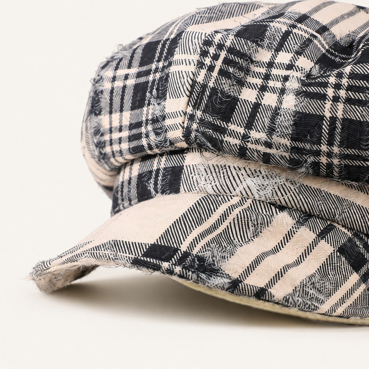 Rue Revival Plaid Newsboy Cap in Black Beige, fabric and hardware detail.
